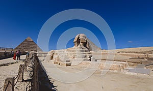 Main View to the Great Sphinx of Giza with the Great Pyramid in Background in Giza, Egypt