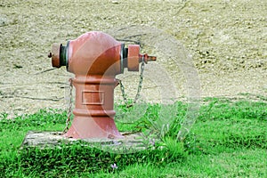 Main water valve on green grass