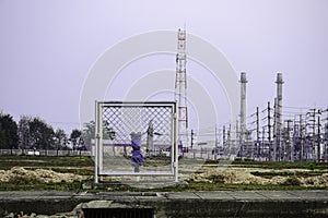 Main water valve with industrail factory background