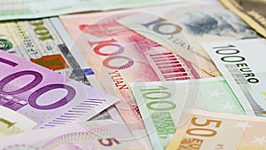 Main word currency Yuan, US Dollar and Euro bank notes, sliding video