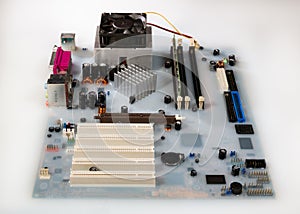 Mainboard card computer flooded by white colored water