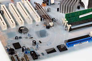 Mainboard card computer flooded by white colored water