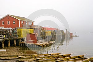 Maine fishing wharf in fog photo