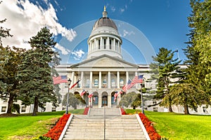 Maine State House, in Augusta, on a sunny day.