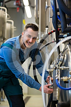 Maintained worker working at brewery photo