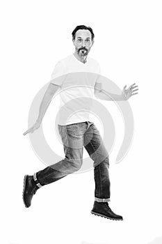 Maintaining active lifestyle. Active man jump isolated on white. Middle age adult. Mature person in casual style