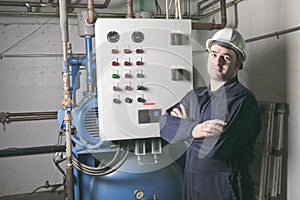 Maintenance engineer checking technical data of