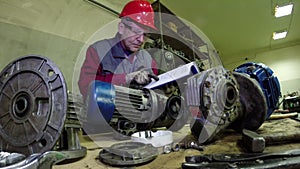 Maintenance Engineer Checking Technical Data