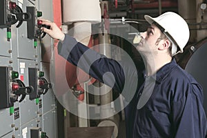 Maintenance engineer checking technical data of
