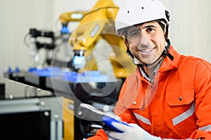 Maintenance engineer working and solving problems on machine