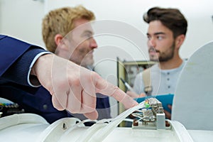 maintenance engineers checking cables