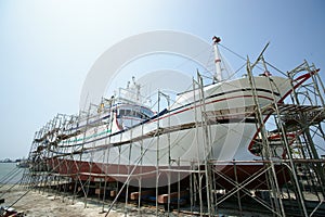 Maintenance of fishing boat.