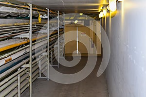 Maintenance Hallway in an industrial building with conduit running down the side