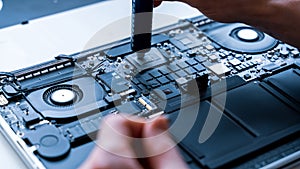 Maintenance pc. Maintenance repair engineer support. Computer technician service with laptop on hardware background