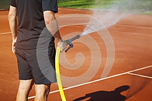 Maintenance sprinkler tennis court