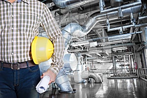 Maintenance technician inside thermal power plant factory