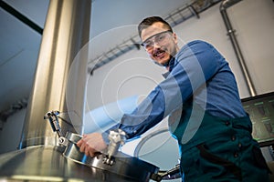 Maintenance worker working at brewery