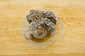 Maitake mushrooms on wooden table