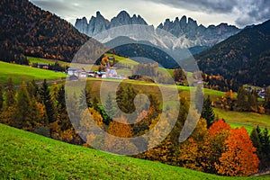 Majestic alpine autumn scenery with Santa Maddalena village, Dolomites, Italy