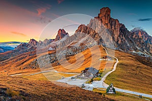 Majestic alpine pass with high peaks in background, Dolomites, Italy