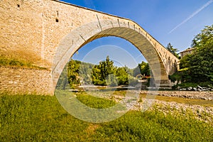 Majestic arch of stone bridge