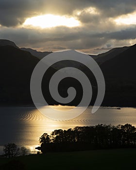 Majestic Autumn Fall landscape image of view from Castlehead in Lake District over Derwentwater towards Catbells and Grisedale photo