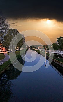 Majestic Canal at Twilight with Glimmering Street Lights photo