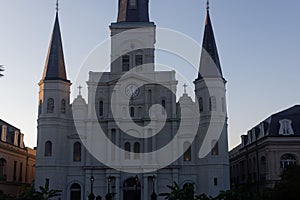 Majestic church with two symmetrical towers, each topped with a clock face