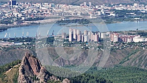 The Majestic Cityscape: A Breathtaking Aerial View of Urban Landscape and Majestic Mountain Ranges