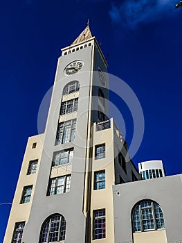 Majestic clock tower stands atop a grand building in San Francisco, California