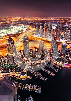 Majestic colorful dubai marina skyline during night. Dubai marina, United Arab Emirates.