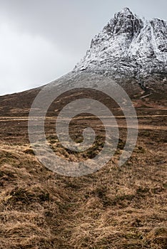 Majestic dramatic landscape Winter image of iconic Stob Dearg Buachaille Etive Mor mountain in Scottish Highlands photo