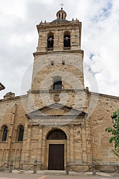 Majestic front view at the iconic spanish Romanesque architecture building at the Catedral Santa Maria de Ciudad Rodrigo towers photo
