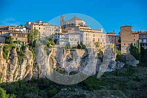 Majestic full view at the Cuenca Hanging Houses, Casas Colgadas, and San Pedro church tower, iconic architecture on Cuenca city