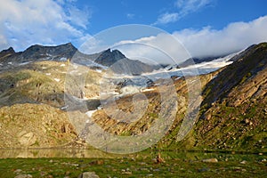 Majestic glacier landscape during sunrise at Simonysee lake in Alps, Matrei in Osttirol, Austria