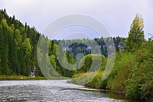 The majestic gypsum stone massif Usvinskie Stolby on the right bank of the Usva River