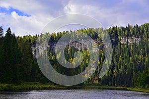 The majestic gypsum stone massif Usvinskie Stolby on the right bank of the Usva River