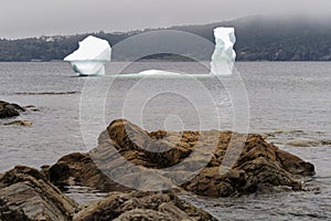 A majestic iceberg near the shore