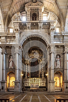 The majestic interior decorations of the Sao Lourenco church in Porto, Portugal photo