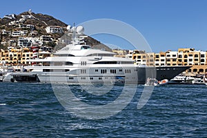 Majestic luxury yacht docked at the pier of the port of Cabo San Lucas in Mexico