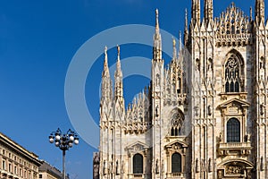 Majestic milan cathedral facade under blue sky