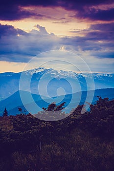 Majestic morning mountain landscape. Dramatic overcast sky.