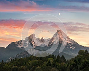 Majestic mountain formation with colorful sunset sky