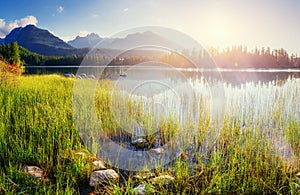 Majestic mountain lake in National Park High Tatra. Strbske ples