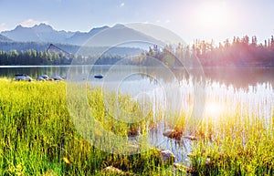 Majestic mountain lake in National Park High Tatra. Strbske pleso, Slovakia