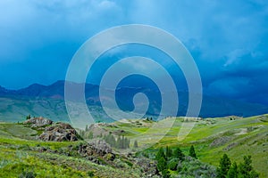 Majestic mountain landscape, cloudy sky before a thunderstorm