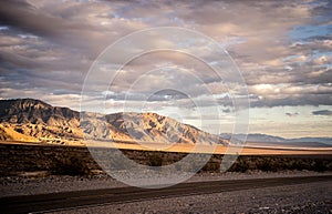 Majestic mountain peaks under the sunset in Death Valley photo