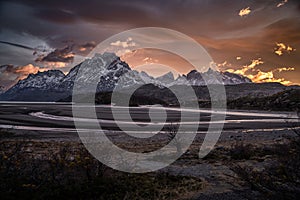 Majestic mountain range and lake in Torres del Paine national park, Chile at sunset