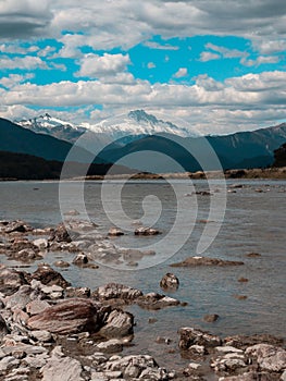 Majestic mountain range rising behind tranquil lake from Pleasant Flat in Mt Aspiring National Park