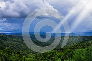 Majestic mountains landscape under morning sky with clouds. Over